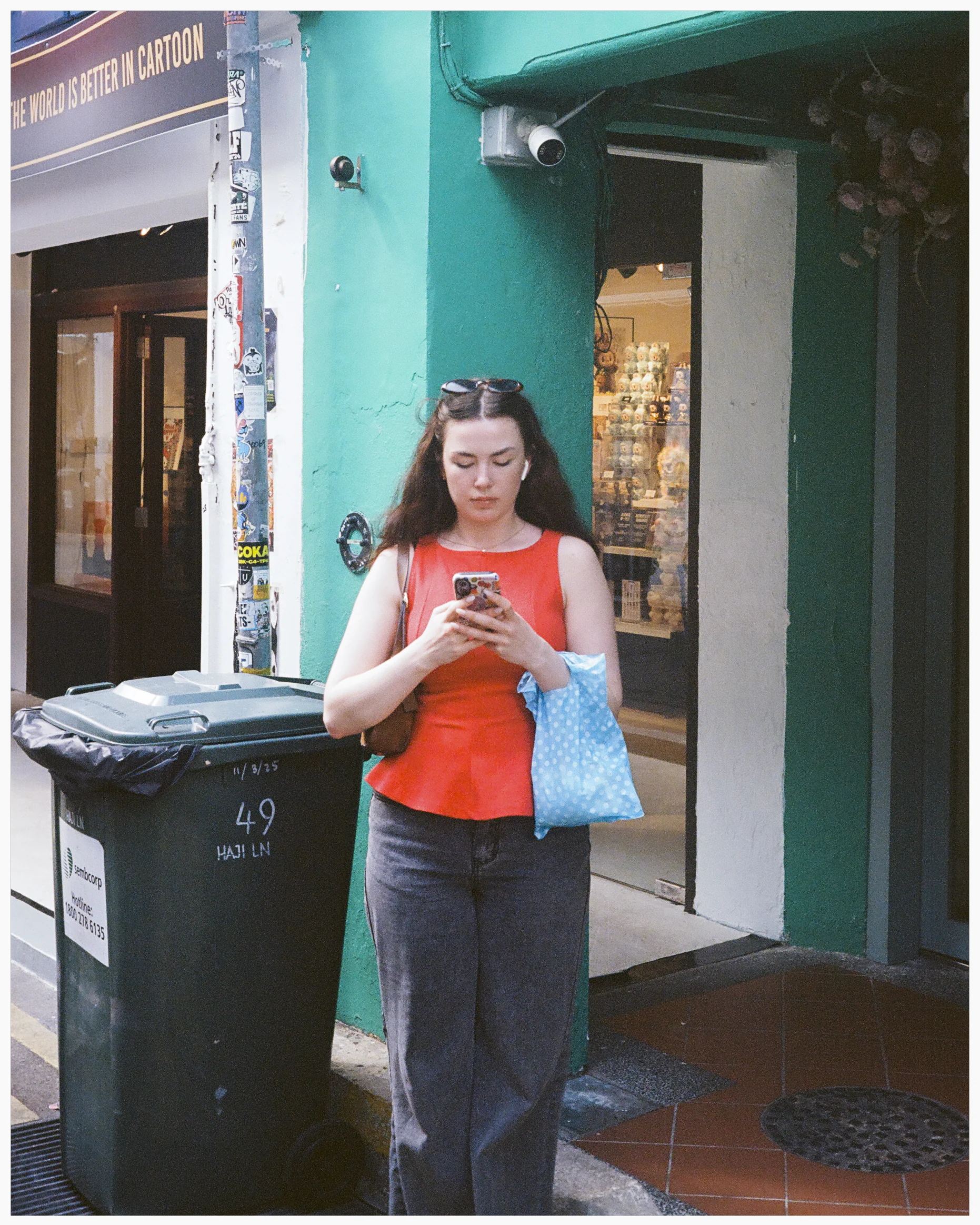 People — a person waiting alone at a bus stop