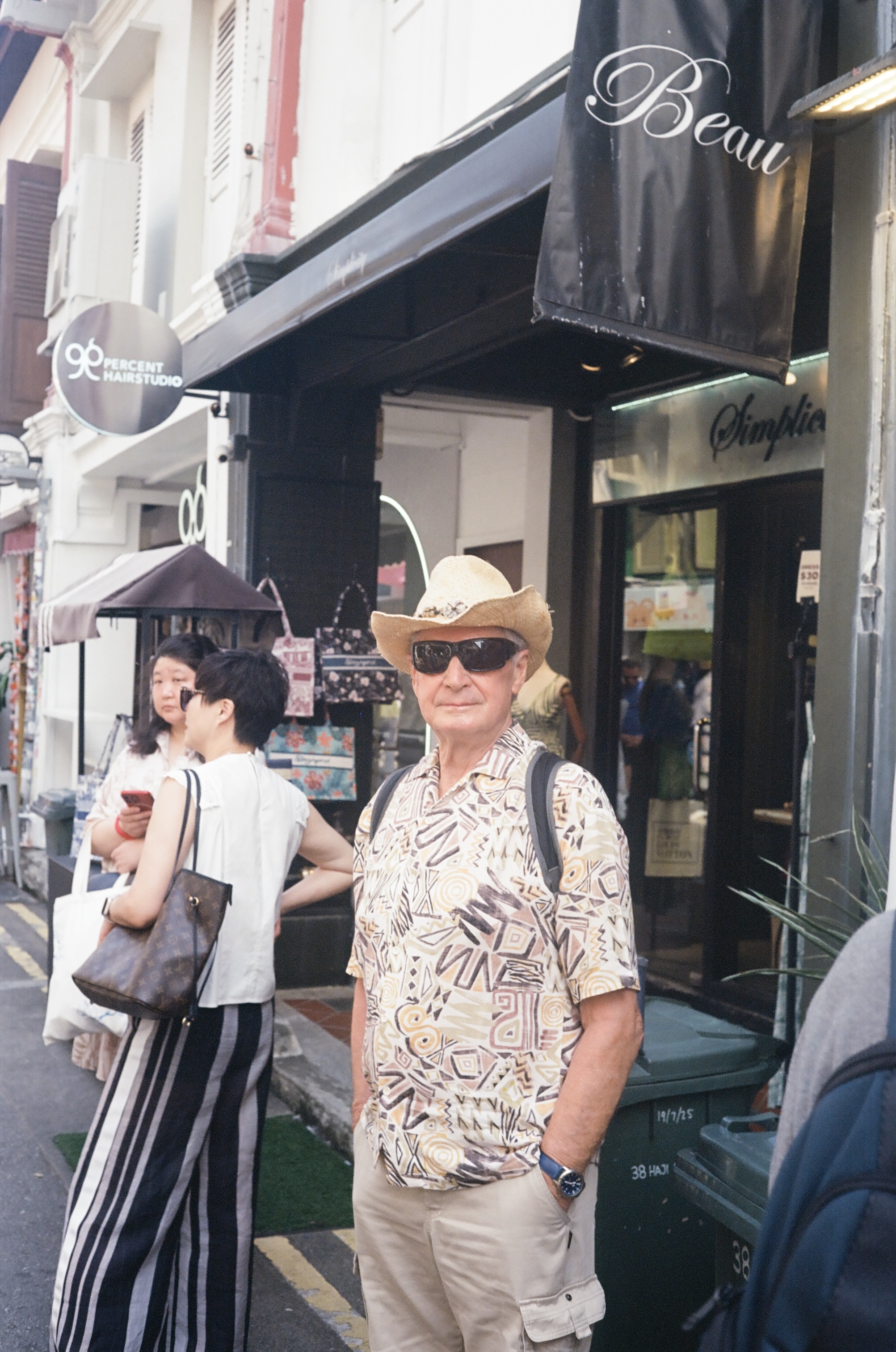Portrait — a self-portrait reflected in a shop window